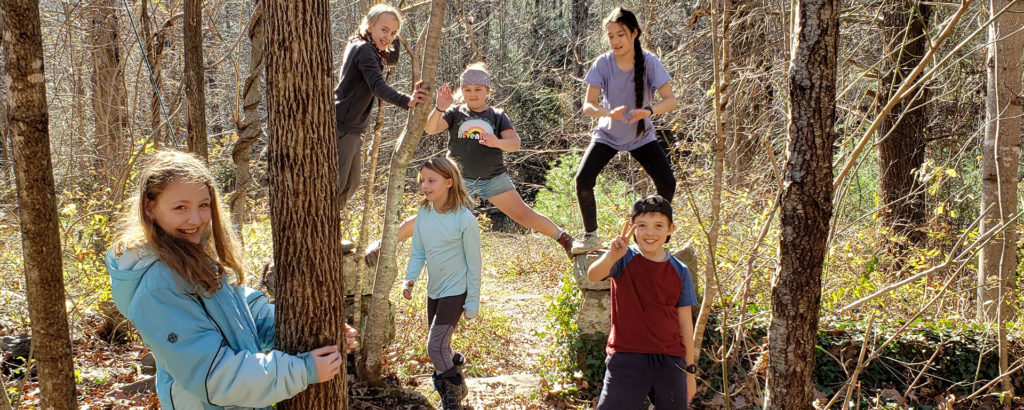 Fall homeschool kids playing at Forest School